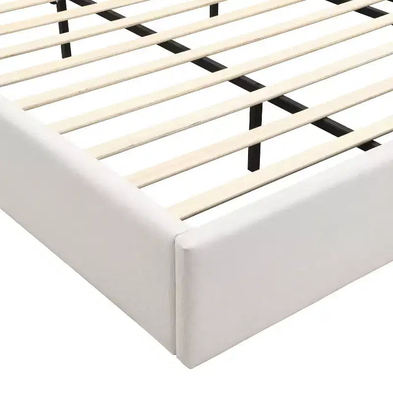 Cama de plataforma de madera tapizada con chenilla con cabecero y lámpara de lectura